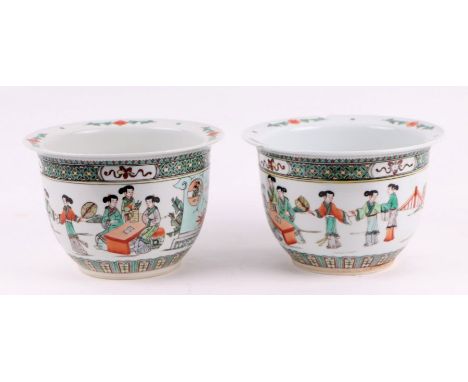A pair of Chinese Republic style famille rose planters decorated with figures in a landscape, 21cms diameter (2).Condition Re