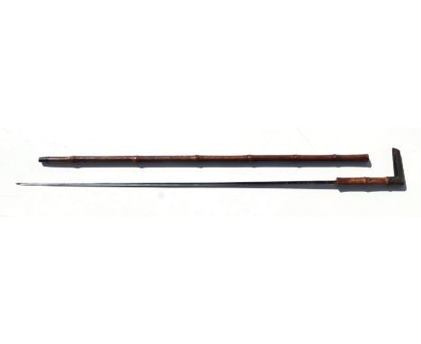 A bamboo sword stick with triangular tapering steel blade, overall 96cms long, blade length 78cms.