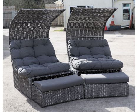 A pair of Rehau All Weather Weave canopied garden chairs with matching footstools and cushions (2).