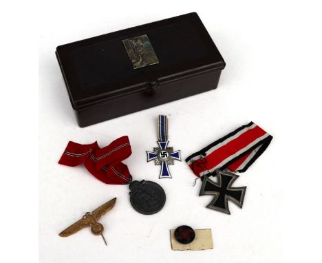 WWII Nazi interest comprising a Mother's Cross, an Iron Cross Second Class, a Russian Front medal, an Eagle lapel badge and a