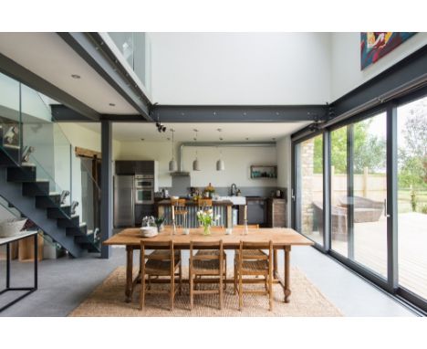 THREE NIGHTS IN AN IDYLLIC COTSWOLDS BARN This is not your average Cotswolds barn conversion. It's a very smart, contemporary