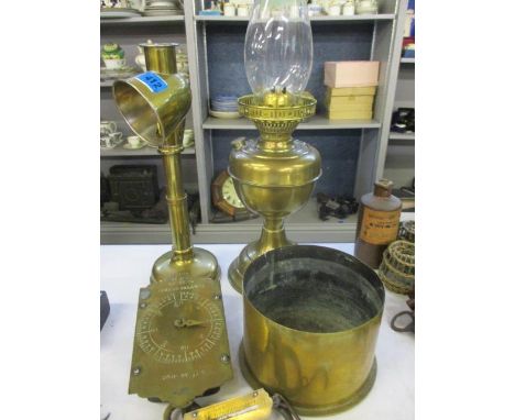 A brass shell case, a Davy lamp, an oil lamp with glass funnel and Salters Spring Balance scales 