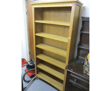 A modern light oak, six tier bookcase, 70 3/4" h x 35 1/2"w 
