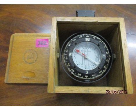 A boxed Silva ships compass 