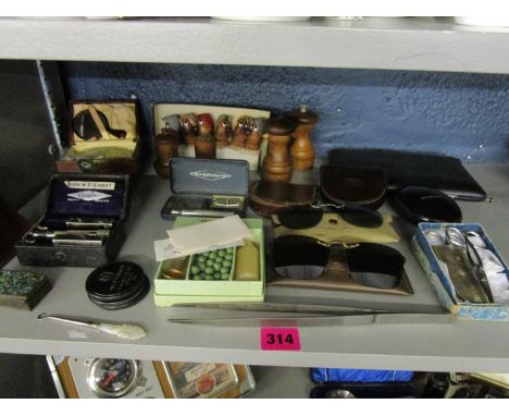 A mixed lot to include cased Gillette razors, sunglasses, a geometry set, wooden cruets, pepper grinders, cased brush set and