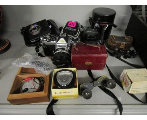 A Nikon camera with additional lens and light meter, all cased, Ross opera glasses and other items 