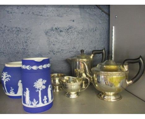 A mixed lot to include glass liqueur decanter, stand and glasses, a Wedgwood jug and vase, along with a silver plated teapot 