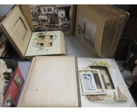 A late 19th/20th century albums containing animal related photograph copies of photographs, clippings and prints and two cart
