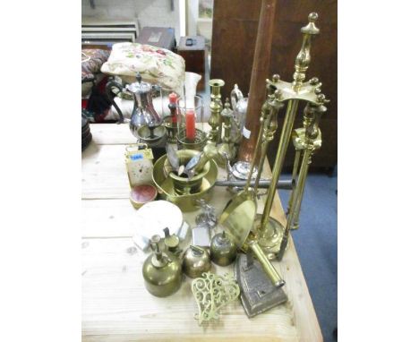 Mixed metalware to include brass candlesticks and silver plate, together with a modern carriage clock and a coffee grinder 