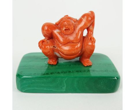 Japanese Carved Coral Sumo Wrestler Netsuke on Malachite Base. Unsigned. Good condition. Measures 1-1/2 inches tall and 1-1/2