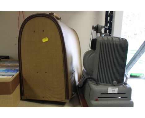 A CASED VINTAGE NIZOLUCIA PROJECTOR