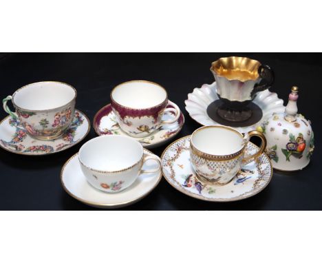 Five Continental porcelain cups and saucers, 19th century, to include: a Meissen Empire cup and saucer, painted with birds be