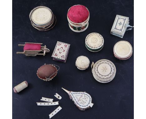 A collection of twelve 19th century carved ivory and bone pin cushions including basket shaped and wheelbarrowCONDITION: - bo