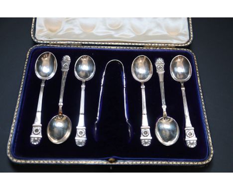 A cased set of six Victorian silver teaspoons and tongs, by Edward Hutton, London, 1884.CONDITION: One spoon has been repaire