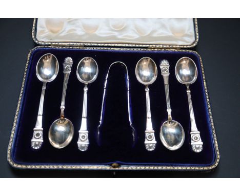 A cased set of six Victorian silver teaspoons and tongs, by Edward Hutton, London, 1884.CONDITION: One spoon has been repaire