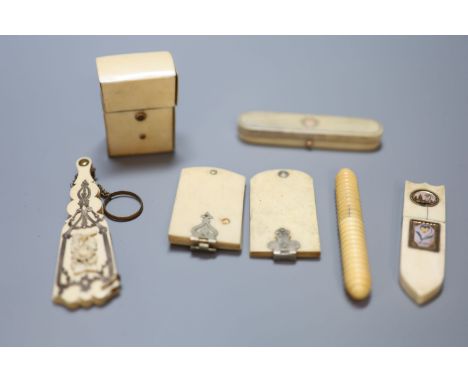 A Regency ivory toothpick case and other assorted accessoriesCONDITION: - gold inset oblong toothpick case, half of the inter