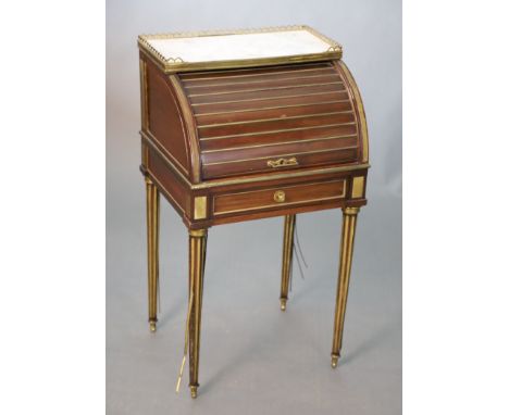 A child's 19th century French gilt metal mounted mahogany cylinder front bureau, with white marble inset top, brass reeded ta
