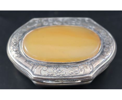 A 19th century Continental engraved white metal snuff box, with inset agate hinged cover, 57mm, gross 31 grams.CONDITION: Min