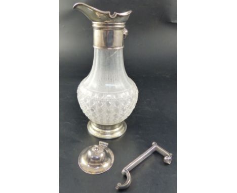 A Victorian silver mounted cut-glass claret jug, with hobnail and slice-cut decoration, Edward Hutton, London 1887, height 27