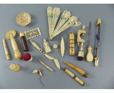 A group of assorted 19th century ivory sewing implements and objets d'artCONDITION: - reeded and ring turned clamp with reel 