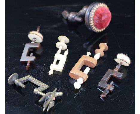 Five assorted early 19th century sewing clamps including TunbridgewareCONDITION: - Tunbridgeware pin cushion clamp - looks li