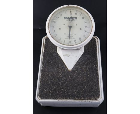 A set of Salter Grosvenor bathroom scales, number 20100 20 Stone by 1LB, 31cm height 21cmCONDITION: Worn from use with some o