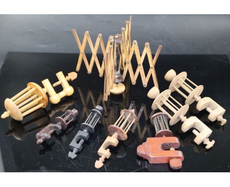 A collection of assorted treen silk winding winders including an early 19th century boxwood exampleCONDITION: - early 19th ce