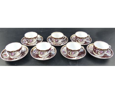 A set of seven Continental porcelain tea cups and saucersCONDITION: Cups with light wear to gilding particularly around the r