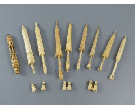 A collection of 19th century turned ivory and bone needle cases incorporating Stanhopes and other Stanhope itemsCONDITION: - 