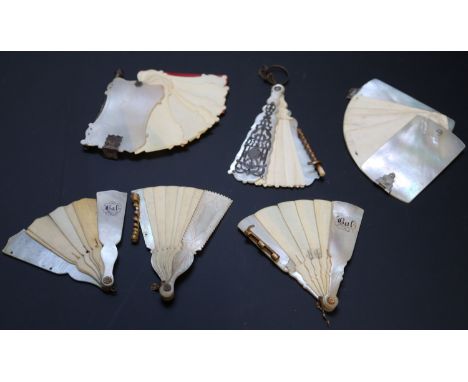 Six 19th century Palais Royale mother of pearl mounted dance cards and note cases including fan shaped, largest 9cmCONDITION: