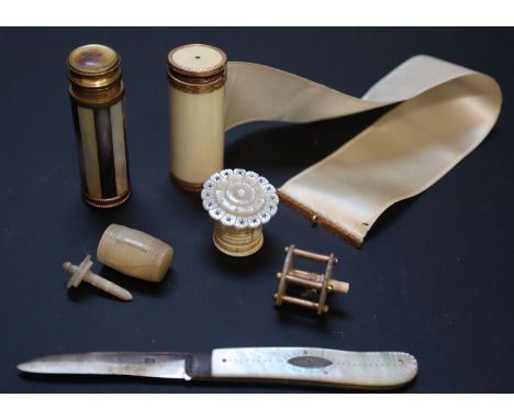 Four 19th century Palais Royale mother of pearl and ivory tape measures and two other accessoriesCONDITION: -gold mounted ivo