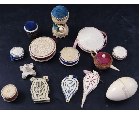 A collection of twelve assorted 19th century ivory pin cushions including teapot, stand with integral tape measure and bellow