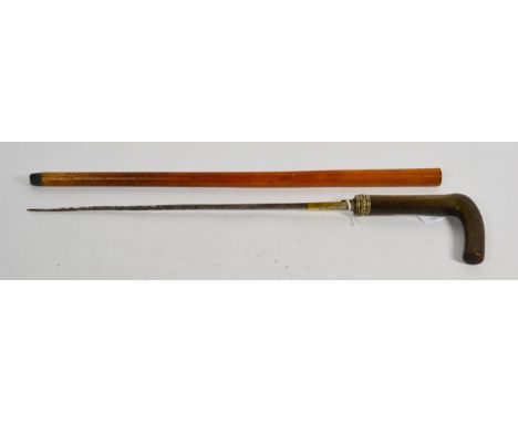 A sword stick of small proportions, possibly a swagger stick or child's cane