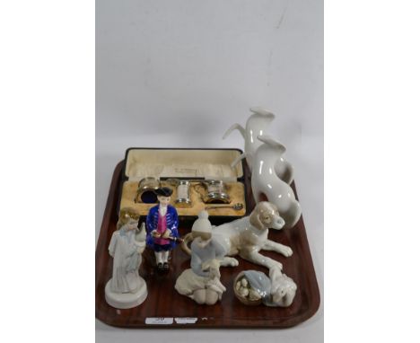 A cased silver salt and pepper set, (one later plated spoon), two Lladro figures, Royal Doulton figure ''Boy from Williamsbur