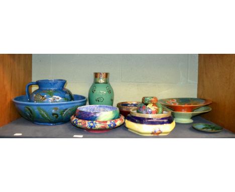 A collection of decorative ceramics including a Brannam jug and bowl set, stylised with carp on a blue ground; a Wedgwood gre