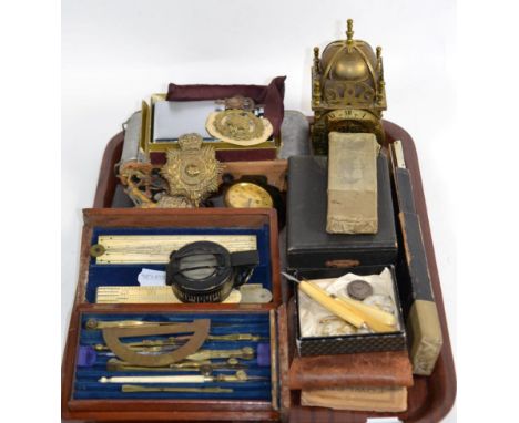 A WWII prismatic marching compass, an Edwardian cased draughtsman set including ivory rule by A Mathieson &amp; Son Edinburgh