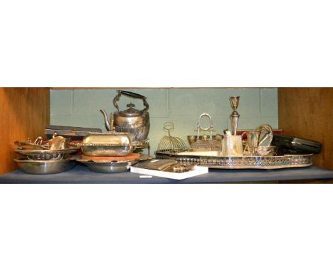 A large quantity of silver plate, including a shaped oval gallery tray, an egg cruet, an entree dish and cover, a seven bar t