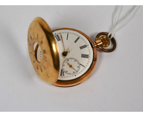 A half hunter pocket watch, case stamped 14K