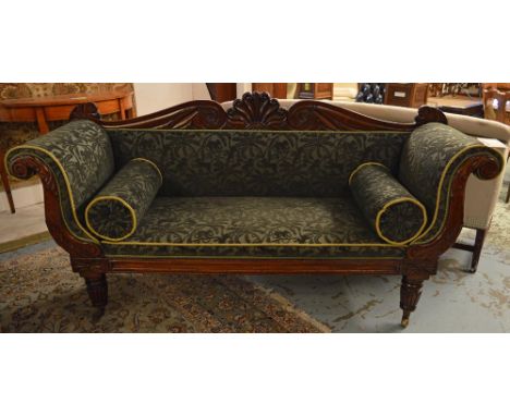 SOFA, William IV mahogany in green raised velvet fabric, animal design on turned fluted supports and two bolster cushions, 20