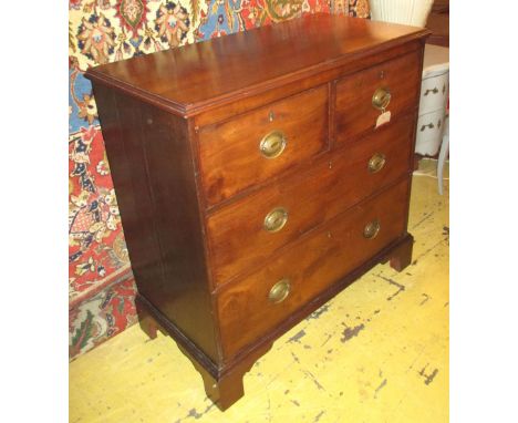 CHEST, George III mahogany with two short over two long drawers on bracket supports, 95cm W x 46cm D x 96cm H. (with faults)