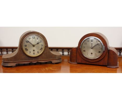 Walnut cased mantel clock and an oak case mantel clock, both with silvered dials and three train Westminster chime movements,