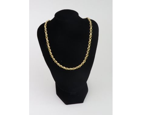 An Italian 9ct gold necklace in the form of 'hearts and kisses', Birmingham, post-2000 import marks, 43cm long, 20.7gms.