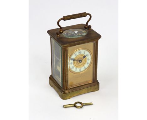 Mappin & Webb; A brass cased carriage clock, late 19th century, the enamel dial painted with Arabic numerals and within a gil