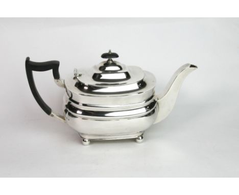 A George III style three-piece silver tea service, James Dixon & Sons, Sheffield 1932, rounded rectangular form, the teapot w