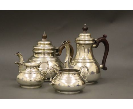 A four-piece silver tea and coffee service, in early 18th century style, Richard Comyns, London 1961, the coffee pot London 1