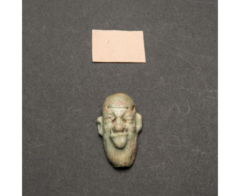 Egypt ceramic Goodness, bearded  face, turquoise collours , demages, late or ptolomaic periode , length 3,5cm The hammer pric