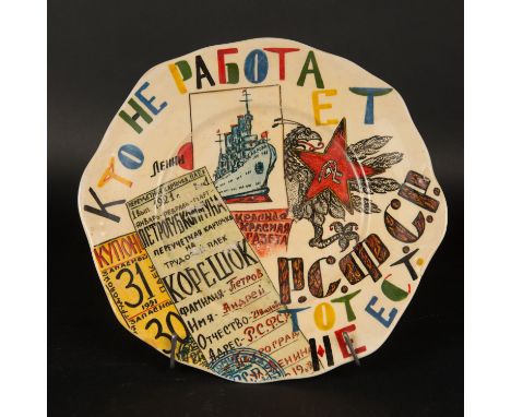 Russian Prop Art Dish, painted in multicolours on white ground glaze. Several descriptions. 20Th Century. 28 cm diameter.