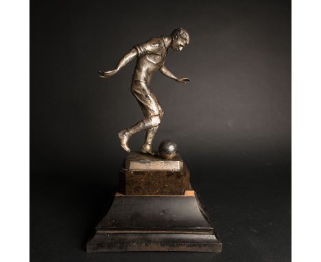 Wilhelm Zwick ( 1839-1916), Football Trophy , silvered metal casc on octagonal stone base on ebonized wooden based described 