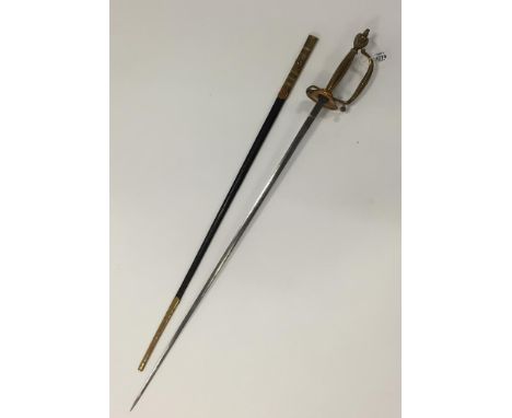 A GEORGE V COURT SWORD, with leather and brass mounted scabbard and engraved blade, 38"