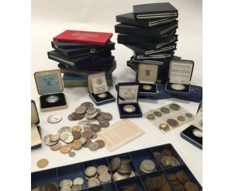 GREAT BRITAIN AND WORLD, MIXED COINS. A collection of Royal Mint presentation year sets, Silver Proof coins, pre-1947 denomin